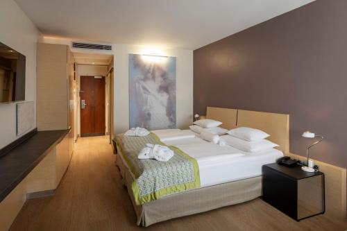 Habitación Doble Confort del hotel Boutique Das Tigra. Foto 4