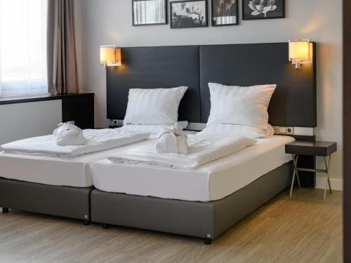 Habitación Doble Privilege del hotel Mercure Potsdam City. Foto 1