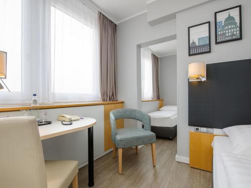Habitación Triple Estándar del hotel Mercure Potsdam City. Foto 6