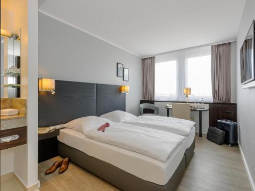 Habitación Superior del hotel Mercure Potsdam City. Foto 1