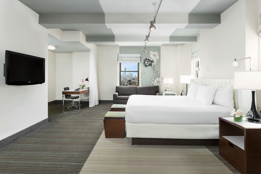 Suite estudio, 1 cama de matrimonio con sofá cama, cocina del hotel Stewart Hotel New York. Foto 4