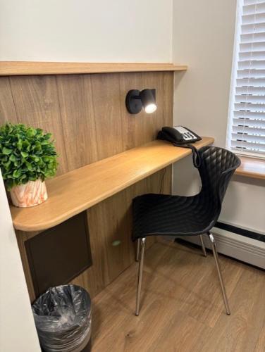 Habitación Individual Estándar con baño compartido del hotel Americana Inn. Foto 6