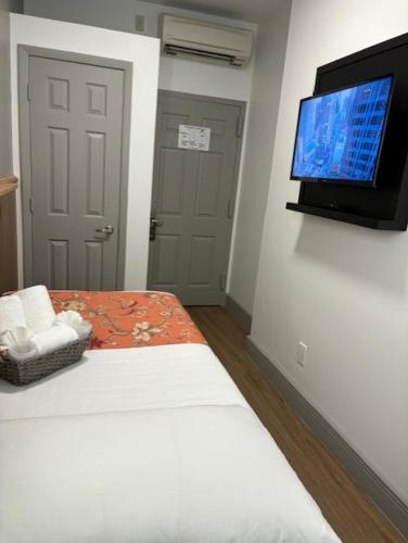 Habitación Individual Estándar con baño compartido del hotel Americana Inn. Foto 8