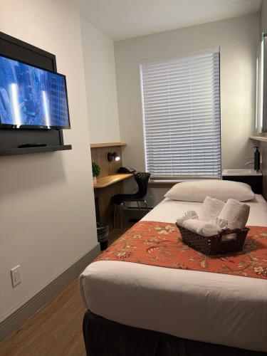 Habitación Individual Estándar con baño compartido del hotel Americana Inn. Foto 11