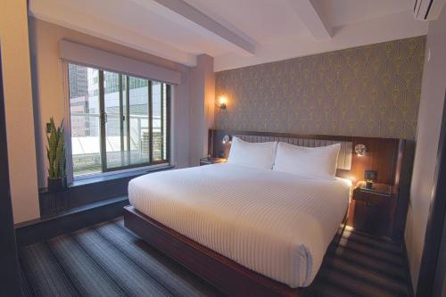Suite Signature con terraza - 1 cama extragrande del hotel Edison. Foto 1
