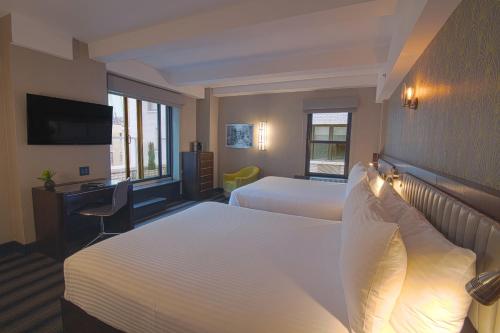 Suite Signature con terraza - 2 camas queen del hotel Edison. Foto 1