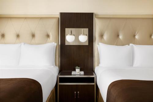 Habitación Estándar con 2 camas dobles del hotel The New Yorker, a Lotte Hotel. Foto 2