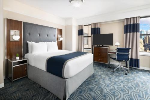 Habitación Executive con cama grande del hotel The New Yorker, a Lotte Hotel