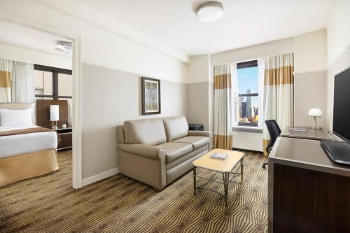 Suite Familiar del hotel The New Yorker, a Lotte Hotel. Foto 1
