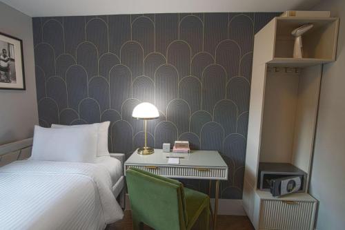 Habitación Superior con 1 cama individual del hotel THE EVELYN. Foto 1