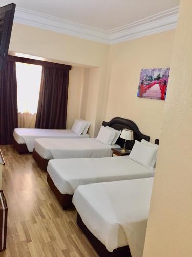Habitación cuádruple del hotel Excelsior