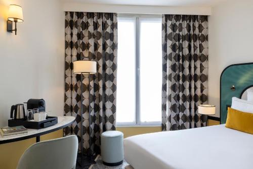 Habitación Clásica del hotel Aiglon. Foto 9