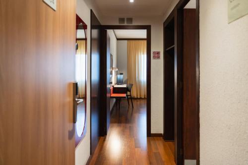 Habitación Doble - 1 o 2 camas del hotel America. Foto 4