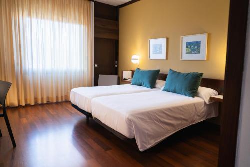 Habitación Doble - 1 o 2 camas del hotel America. Foto 5