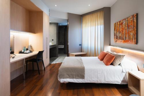 Habitación Doble Deluxe - 1 o 2 camas del hotel America. Foto 8
