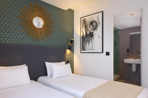 Habitación Doble - 2 camas del hotel OHM by Happyculture. Foto 2