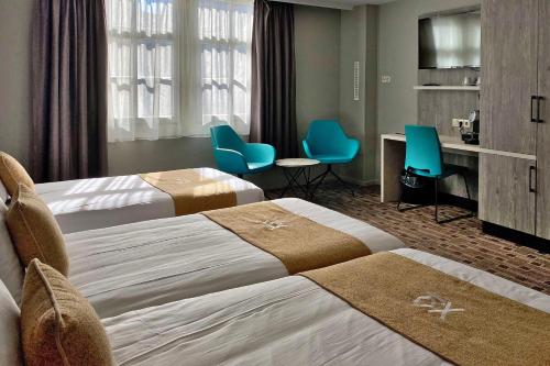 Habitación Triple del hotel Xo Hotels City Centre. Foto 5