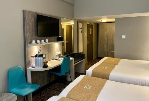 Habitación Cuádruple del hotel Xo Hotels City Centre. Foto 5