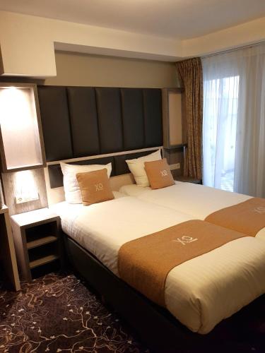 Habitación Doble - Sótano - 2 camas del hotel Xo Hotels City Centre. Foto 2
