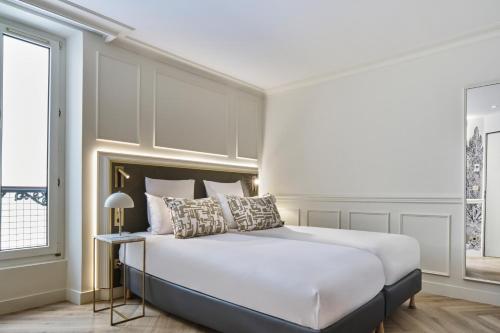 Habitación Doble Clásica - 2 camas del hotel Moulin Plaza. Foto 3