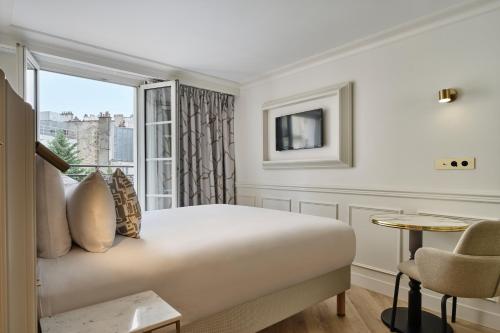 Habitación Doble Clásica con balcón del hotel Moulin Plaza. Foto 5