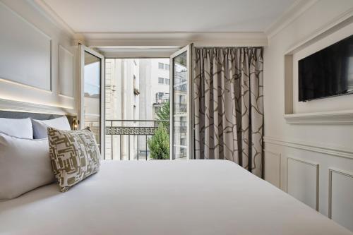 Habitación Doble Clásica con balcón del hotel Moulin Plaza. Foto 6