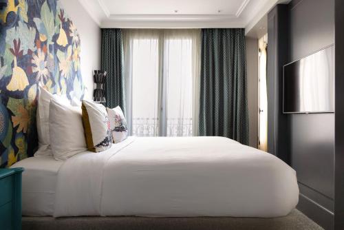 Habitación Triple Executive del hotel Normandy Le Chantier