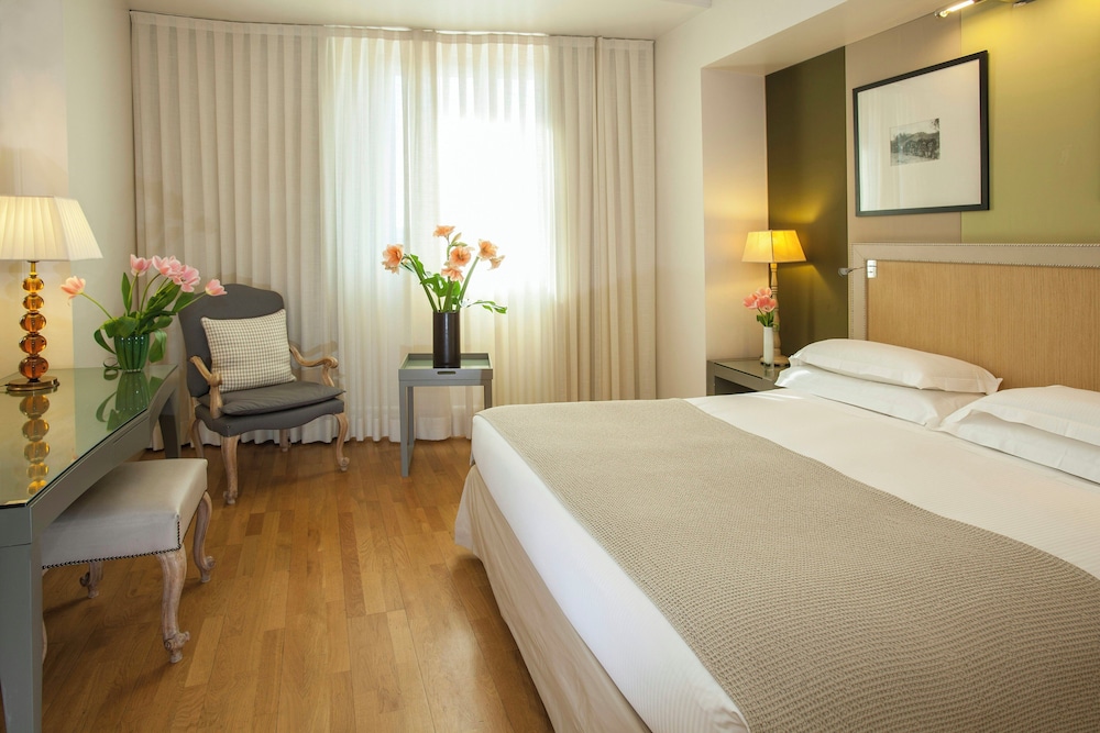 Habitación familiar, habitaciones comunicadas del hotel Starhotels Tuscany