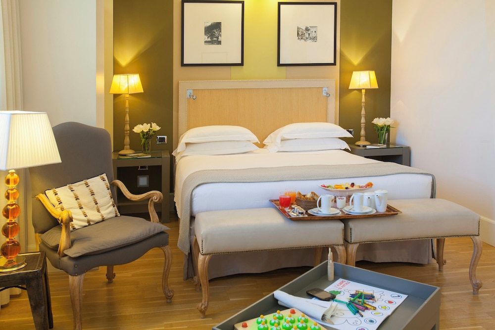 Habitación Triple del hotel Starhotels Tuscany
