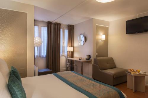 Habitación Triple del hotel Diese Hotel Bastille. Foto 5
