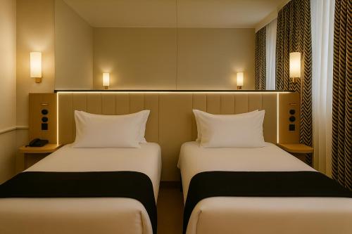 Habitación Doble Estándar del hotel Grand Tonic hôtel & SPA Paris. Foto 4
