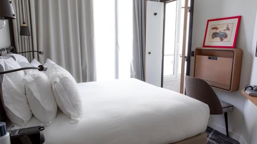 Habitación Doble Pequeña del hotel Maison Mère. Foto 1