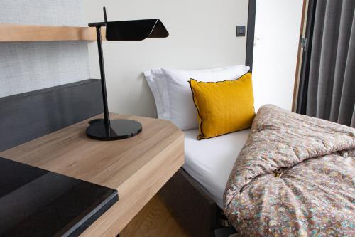 Habitación Triple Deluxe del hotel Maison Mère. Foto 1