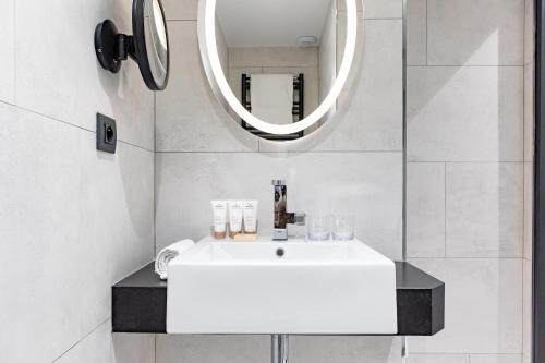 Habitación Triple Deluxe del hotel Maison Mère. Foto 3