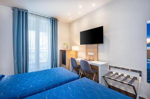 Habitación Executive - 2 camas del hotel Terminus Montparnasse. Foto 1