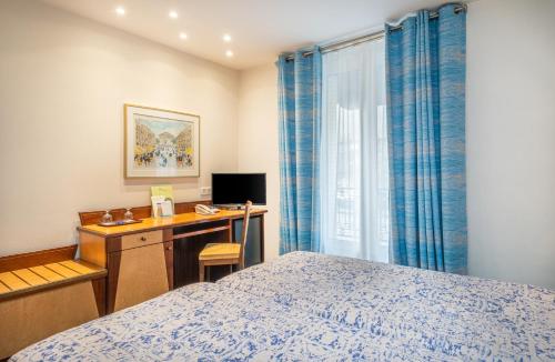 Habitación Executive - 2 camas del hotel Terminus Montparnasse. Foto 4