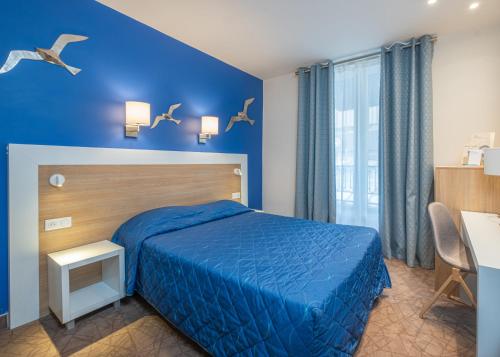 Habitación Doble Club del hotel Terminus Montparnasse. Foto 3