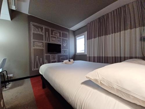 Habitación Doble Estándar del hotel Ibis Toulouse Purpan. Foto 6
