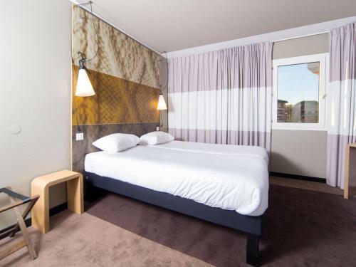 Habitación Estándar con 3 camas individuales del hotel Ibis Toulouse Purpan