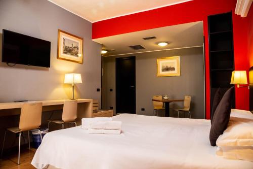 Habitación Doble con Cama supletoria del hotel Berlino