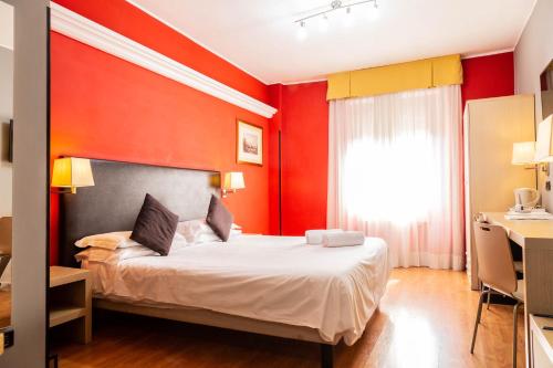 Habitación Doble con Cama supletoria del hotel Berlino. Foto 1