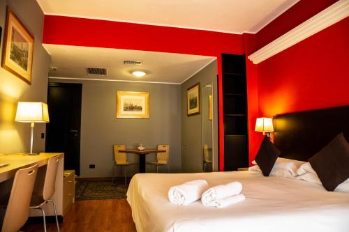 Habitación Doble con Cama supletoria del hotel Berlino. Foto 9