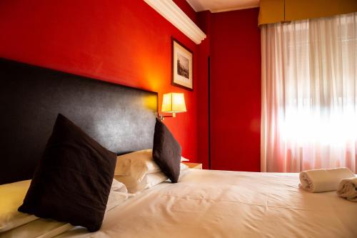 Habitación Doble con Cama supletoria del hotel Berlino. Foto 10