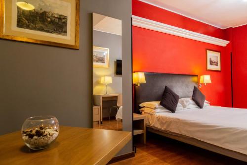 Habitación Doble con Cama supletoria del hotel Berlino. Foto 13