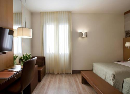 Habitación Doble Deluxe - 1 o 2 camas del hotel Starhotels Ritz. Foto 4
