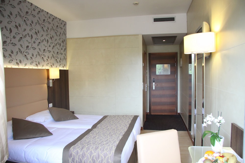 Habitación con 2 camas individuales del hotel Lh Sirio Venice