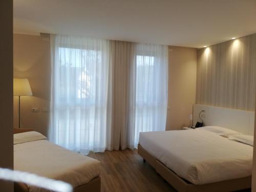 Habitación Triple del hotel Novo Rossi