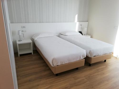 Habitación Doble adaptada para personas con movilidad reducida del hotel Novo Rossi. Foto 1