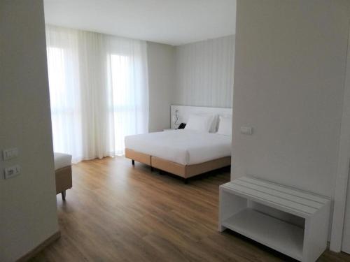 Habitación Cuádruple del hotel Novo Rossi