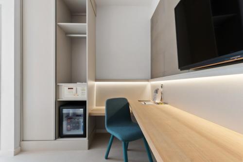 Habitación Deluxe con set de té del hotel Areca. Foto 1